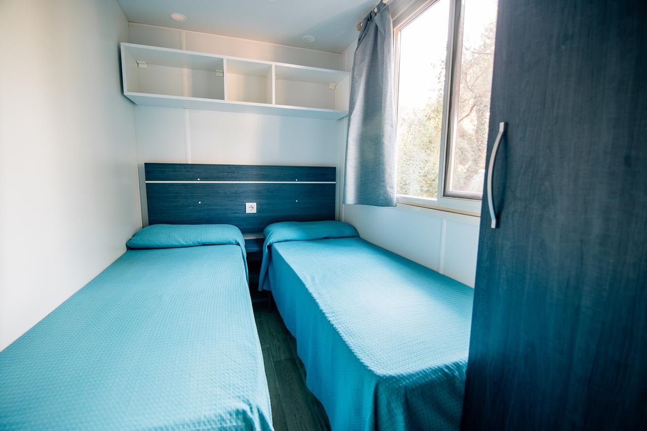 Kleines Mobilheim (4 Erwachsene) mit Zugang zum Strand